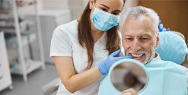 A man enjoying the immediate benefits of his dental implants