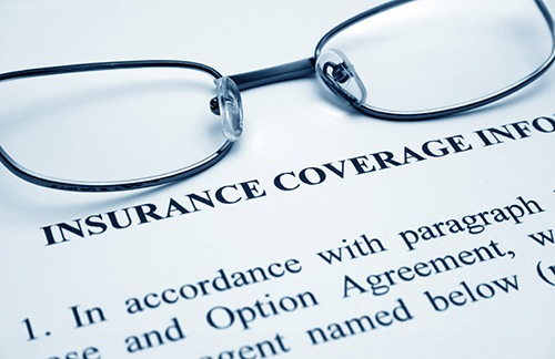 insurance form with glasses